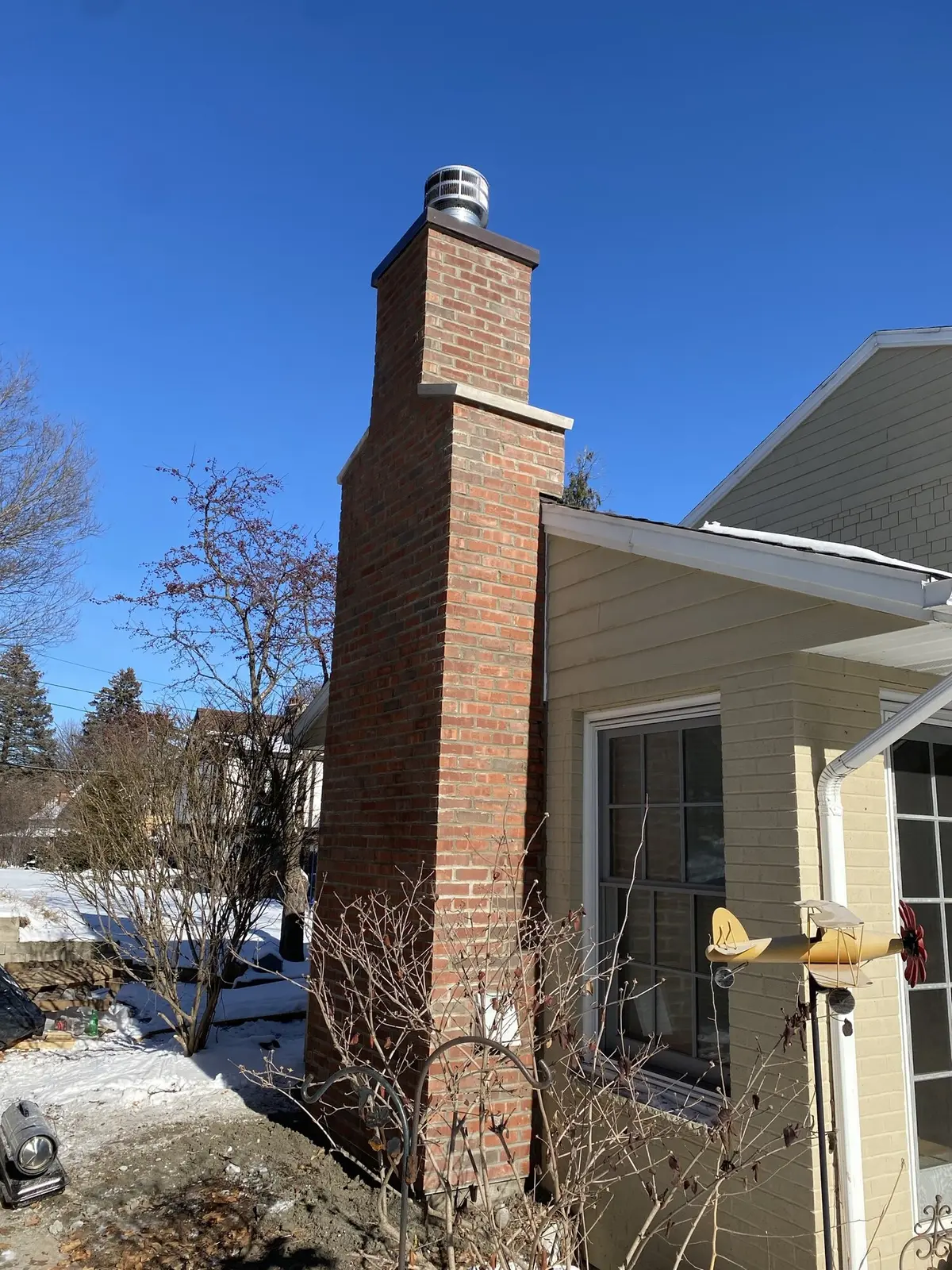Brick chimney installation with clean joints