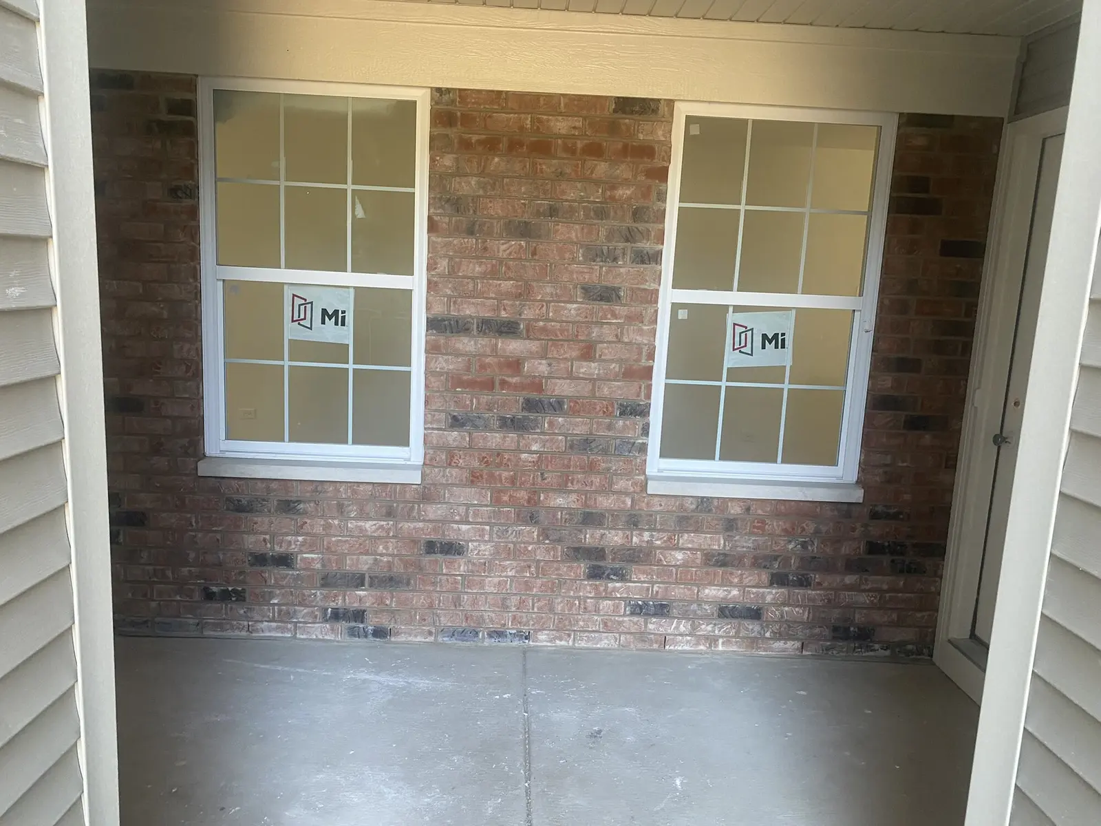 Brick veneer wainscot corner on custom home