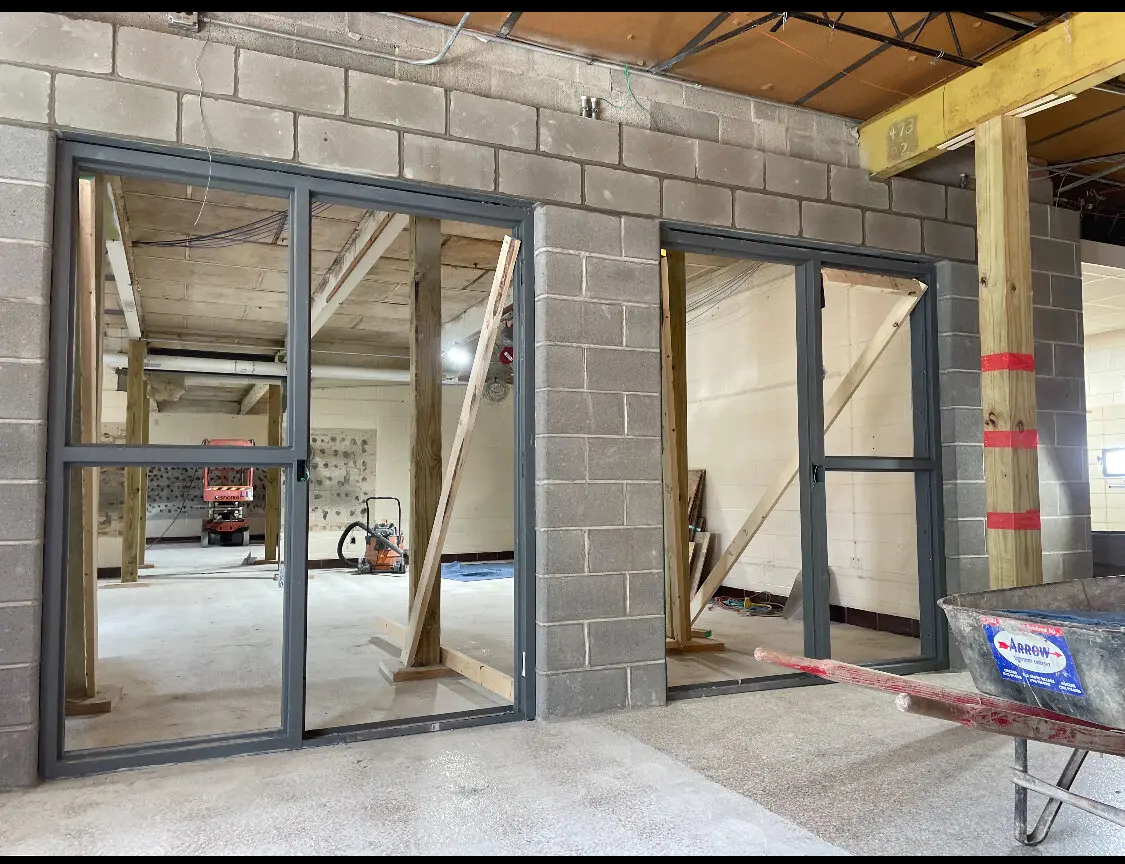CMU block wall with steel door frames, commercial interior