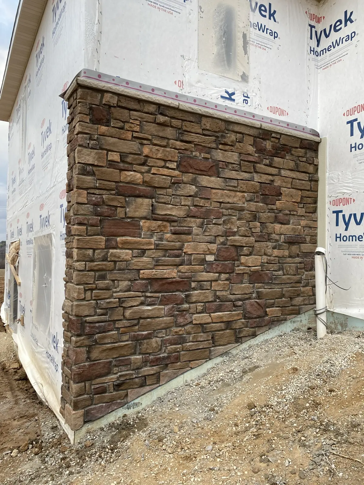 Stone veneer corner detail on custom home